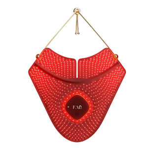 The Foreo FAQ 211 flexible silicone wireless LED neck and décolletage mask in a vibrant coral pink, featuring an ergonomic shield pattern, a central diamond-shaped FAQ control module, and a gold adjustable neck strap, engineered for zero-gap targeted collarbone skin rejuvenation