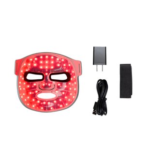 Skinletics Light Therapy Pro Face Mask with charging cable, power adapter, and adjustable head strap included.