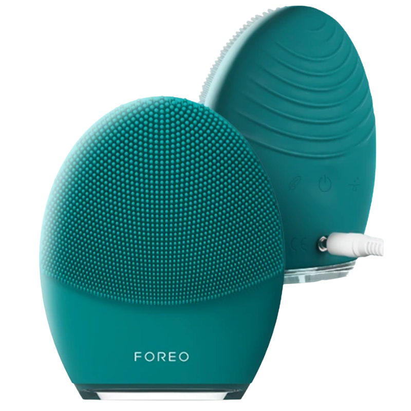 Front and back view of the FOREO LUNA 4 MEN smart facial brush in Evergreen, showcasing the front cleansing bristles and the reverse side ridges with a plugged-in white charging cable.