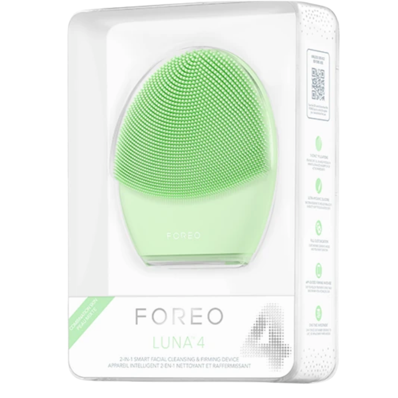 FOREO LUNA 4 smart facial cleansing brush in Pistachio Green for balanced skin types, shown inside its clear-front retail packaging.