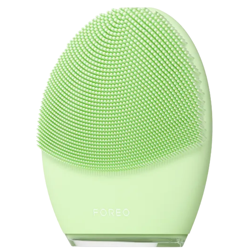 Close-up of the front side of the FOREO LUNA 4 smart facial brush in Pistachio Green, showcasing the dense, soft silicone cleansing bristles designed for sensitive skin.